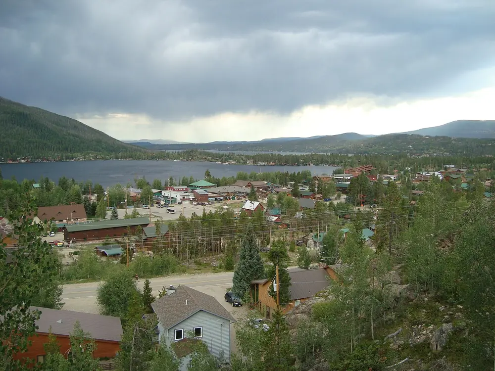 Town of Grand Lake and its lake seen from a hillside viewpoint in Colorado